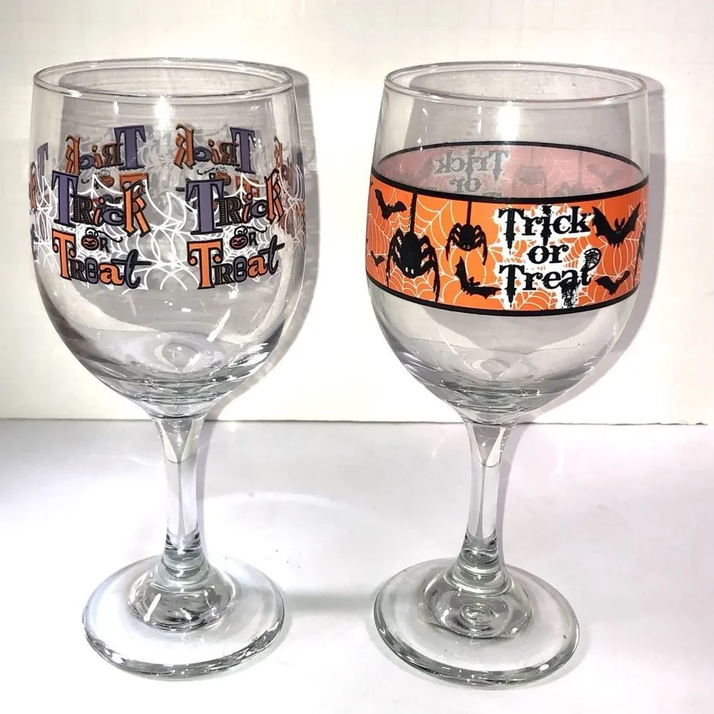 1pair of Trick or Treat Wine glasses HALLOWEEN decor 7 inches tall EUC